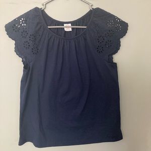 Dark navy blue shirt/blouse.